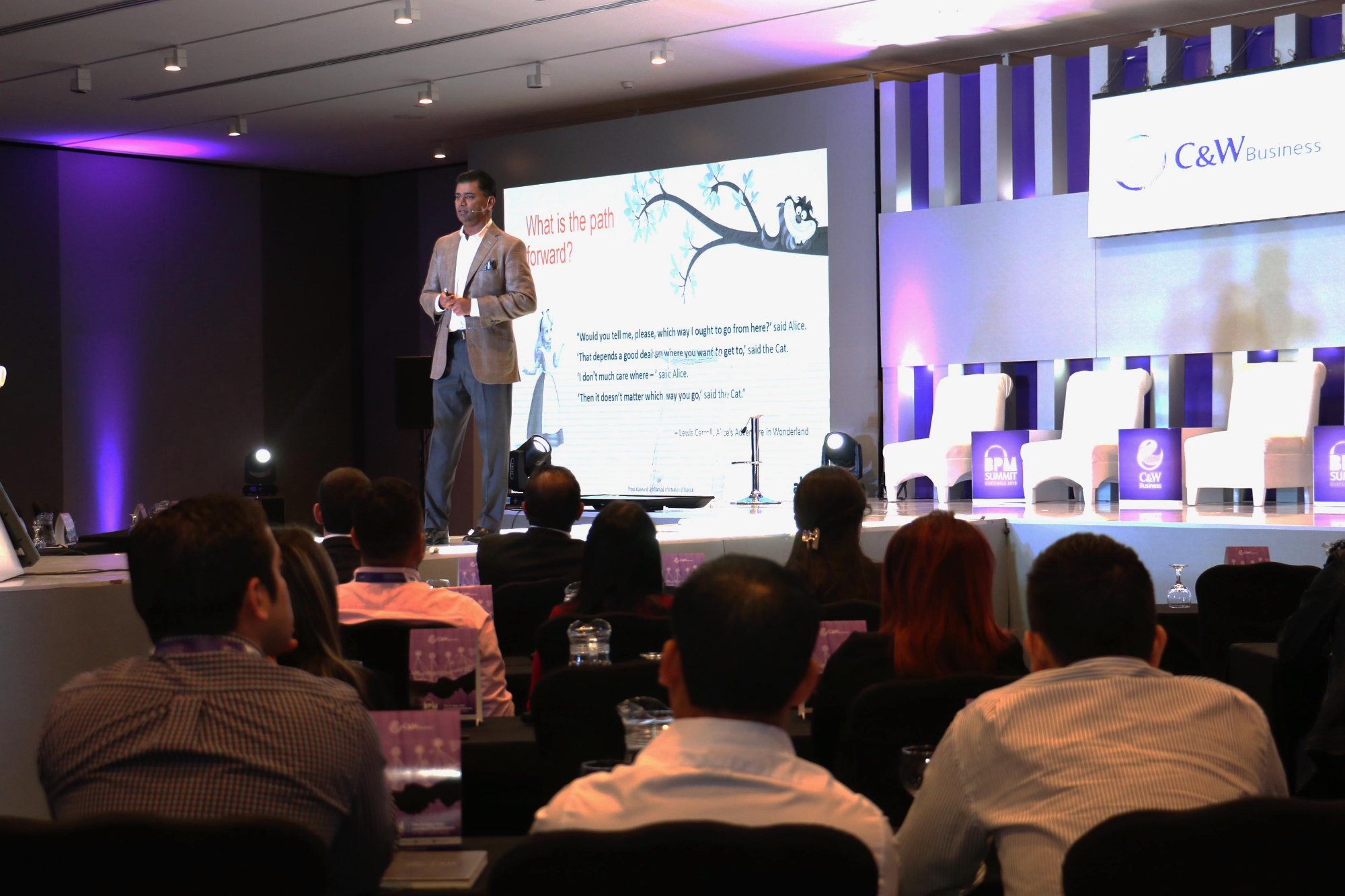 Ashish Bisaria speaking on stage at the C&W Business BPM Summit